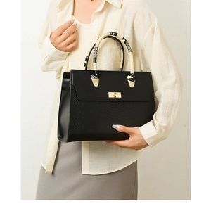 Chic black litchi pattern tote bag with snakeskin texture and silk scarf handle
