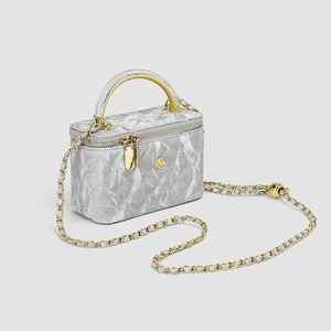 Quilted marble pattern underarm handbag with gold bee logo and metal chain strap