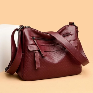 Burgundy high-capacity crossbody bag with woven texture and multiple zipper pockets