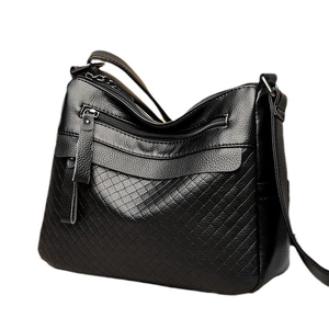 Large black lychee pattern leather shoulder bag with quilted texture and zippers