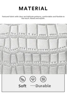 Close-up of crocodile embossed synthetic leather showing soft, durable texture and silver finish