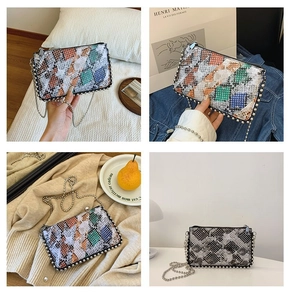 Detailed views of multi-color snake pattern crossbody bag with pearl trim and chain strap