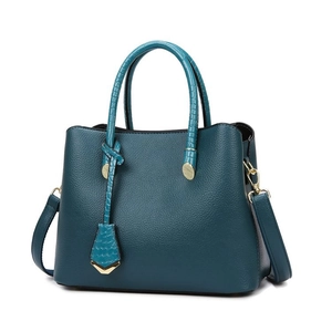 Peacock blue lychee pattern tote bag with crocodile embossed handles and gold hardware