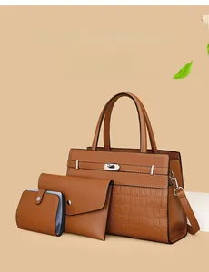 Three-piece brown PU leather handbag set with large tote and metal clasp details