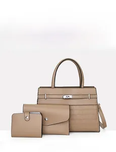 Three-piece caramel handbag set with crocodile pattern detail and metallic closure