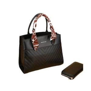 Chic black V-quilted tote bag set with matching long wallet and floral silk handle scarf