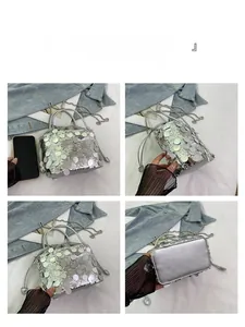 Detail view of silver sequin bucket bag featuring drawstring closure and chain strap