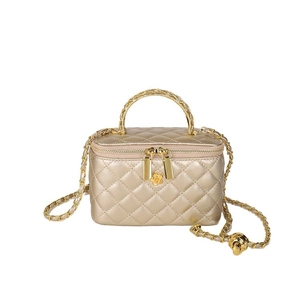 Elegant gold quilted mini handbag with metal handle and chain strap for women