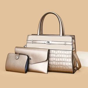 Three-piece metallic champagne tote bag set with crocodile texture and silver lock