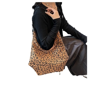 Stylish leopard print hobo bag with slim leather straps and spacious interior for women