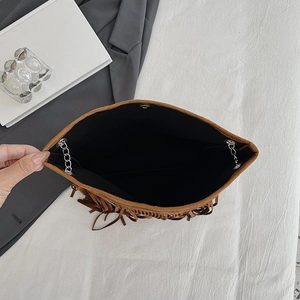 Brown suede tassel shoulder bag with metallic chain strap and spacious interior