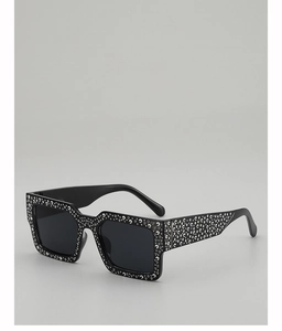 Detail of rectangular punk sunglasses with full rhinestone studs on black frames