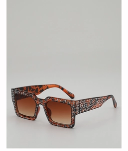 Detail of rectangular rhinestone sunglasses with tortoiseshell frame and gradient brown lenses
