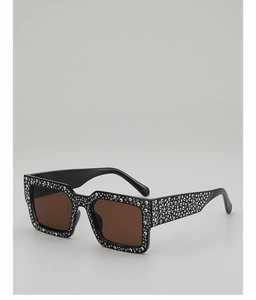 Detail of rectangular punk sunglasses with sparkling rhinestones on black frames