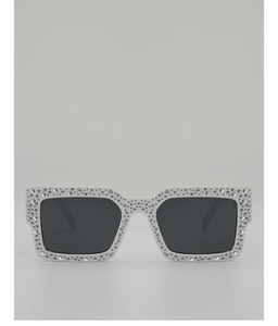 Macro detail of rectangle sunglasses frame with silver crystal rhinestone embellishments