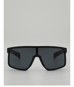 Vue frontale de lunettes de soleil masque noires oversize avec pont nasal intégré