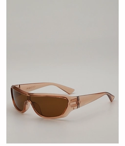 Détail de lunettes de soleil de cyclisme Y2K avec monture marron et charnière en métal