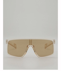 Détail de lunettes de soleil masque rétro avec monture transparente et verres thé ambré