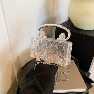 Acrylic box clutch with ice crack pattern, silver lion head handle and chain strap
