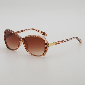 Chic leopard print oversized sunglasses with gradient brown lenses and gold metal accents