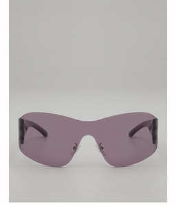 Detailed close-up of Y2K rimless sunglasses featuring purple lenses and metal nose pads