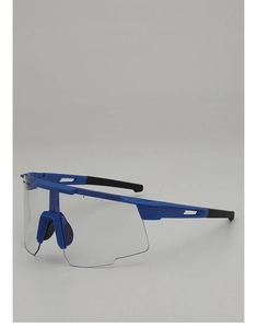 Detail view of blue cycling glasses featuring high-density frames and clear protective lenses