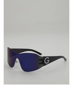 Detail view of the black oversized sunglass temple with a white 'G' letter logo design
