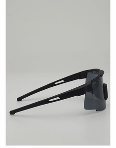 Detail view of black cycling sunglasses featuring streamlined hollowed-out temples design