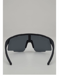Detail view of matte black cycling glasses with a wide one-piece windproof lens