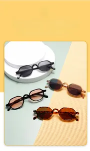 Detail showing various retro polygon kids sunglasses colors on aesthetic circular podium