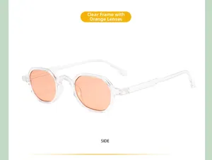 Detail view of retro leopard kids sunglasses with transparent frame and orange lenses