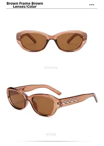 Detail view of tea-colored oval cat eye sunglasses with silver flame metal accents