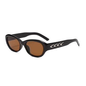 Cat eye sunglasses with black glossy frames and amber lenses featuring silver claw accents
