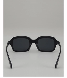 Detailed front view of high-gloss black square sunglasses with dark lenses