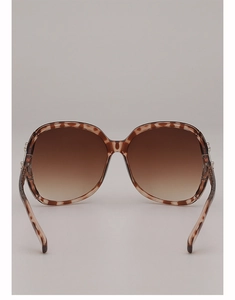 Front view of large-frame sunglasses featuring brown tortoise shell pattern and gradient lenses