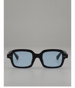 Close-up of square black frame sunglasses with light blue lenses and silver rivet details