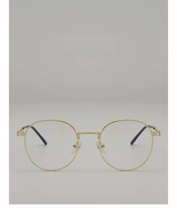 Close-up of minimalist round gold metal eyeglass frames with adjustable nose pads