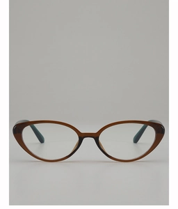 Dettaglio degli occhiali cat-eye vintage con montatura marrone scuro e lenti trasparenti