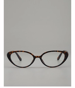Dettaglio ravvicinato di occhiali cat eye vintage con montatura tartarugata ambra