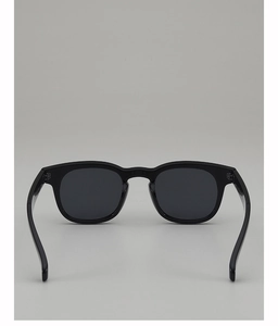 Detailed back view of vintage round sunglasses with black frames and metallic rivet studs
