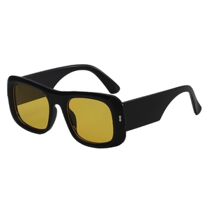 Square black sunglasses with amber lenses and silver rivet studs on 45-degree angle view
