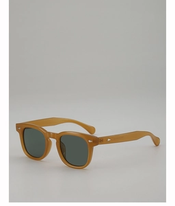 Detailed side view of vintage tortoise shell sunglasses with silver diamond rivets