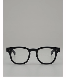 Close-up of retro black round eyeglass frame with silver arrow metal rivets detail