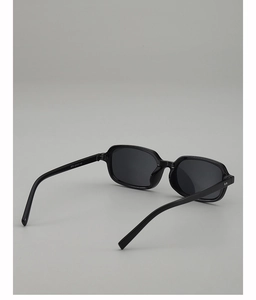Detail view of black square sunglasses with specs 52-17-145 printed on the temple