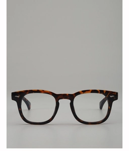 Detail of tortoise shell texture frame with silver diamond-shaped metal rivets