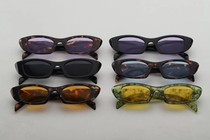 Detailed comparison of six vintage narrow cat eye sunglasses with colorful tinted lenses