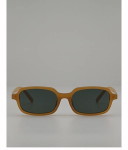 Macro detail of amber rectangle sunglasses featuring translucent frames and dark lenses