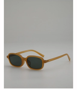 Detail of amber square sunglasses with dark green lenses and metal temple accents