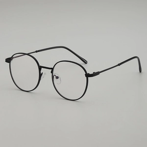 Minimalist round matte black metal glasses frame with clear lenses in a 45-degree view