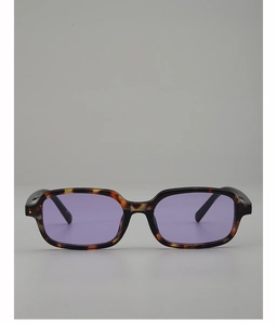 Detail of tortoise shell rectangular frames with purple tinted lenses in Y2K style